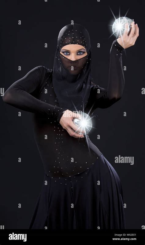Party Dancer In Ninja Dress With Disco Balls Stock Photo Alamy