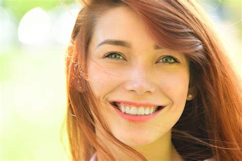 Beautiful Woman Outdoor Close Up Portrait Of Young Beautiful Girl Posing On Spring Nature Near