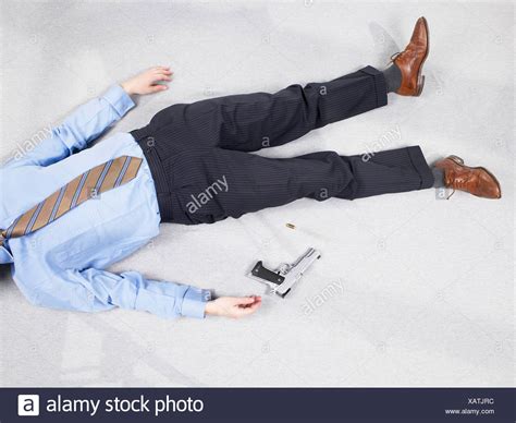 Man Lying Dead On The Floor High Resolution Stock Photography And