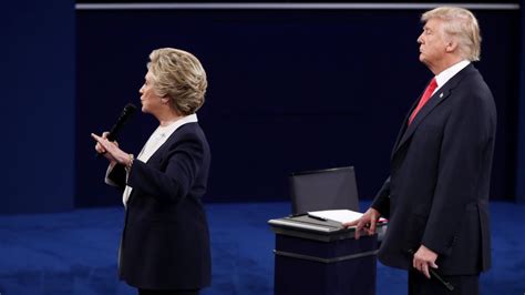 Donald Trump Looms Behind Hillary Clinton At The Debate Cnn Politics