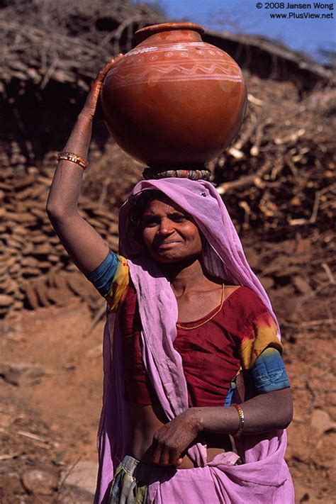 Woman Carrying Ceramic Water Pot Jar Akoda Village India