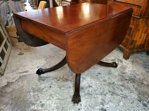 Antique Solid Mahogany Drop Leaf Table With Pedestal Base Carved Claw