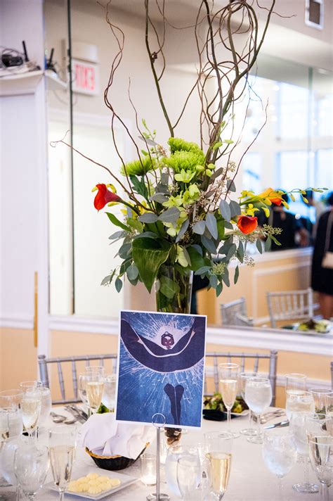 Centerpieces With Chrysanthemums Calla Lilies And Branches