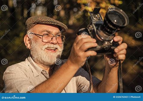 Old Photographer Look In Vintage Camera Outdoors Photographer With