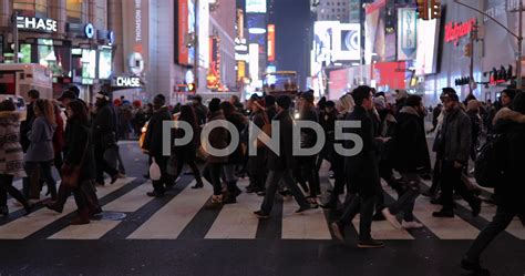 Crowd Of People Walking Crossing Street In New York City Times Square