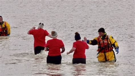 Hundreds Brave The Cold Waters At Port Stanley To Raise Funds To