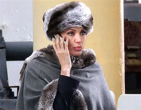 Angelina Jolie Gets A Hat From Russia With Love On Set Of Movie Salt