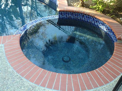 Ultimately the overall color and reflection of your swimming pool is also dependent on the lighting at different times during the day, the surrounding landscape and hardscape. #spa #replaster in #pebble Midnight Blue with #Abalone # ...