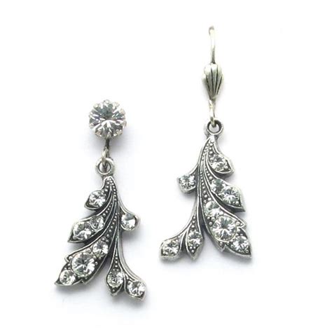 Of course with surfboard print fabric: Anne Koplik Designs. ES 7615 CRY. $25. Made with Swarovski ...