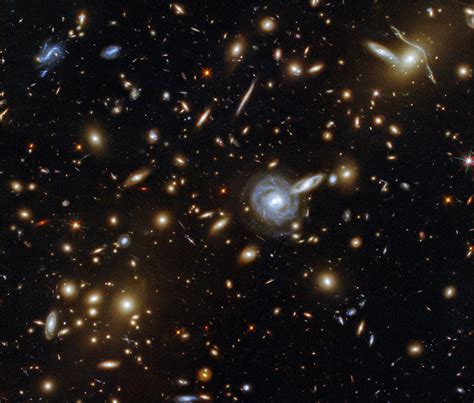 A Menagerie Of Galaxies Hubble Captures A Cluster With Galaxies Of All Shapes And Sizes Satrn