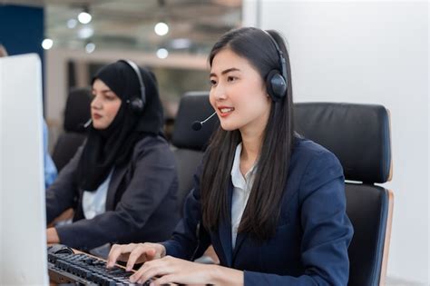 Premium Photo Happy Smiling Operator Asian Woman Customer Service Agent With Headsets Working