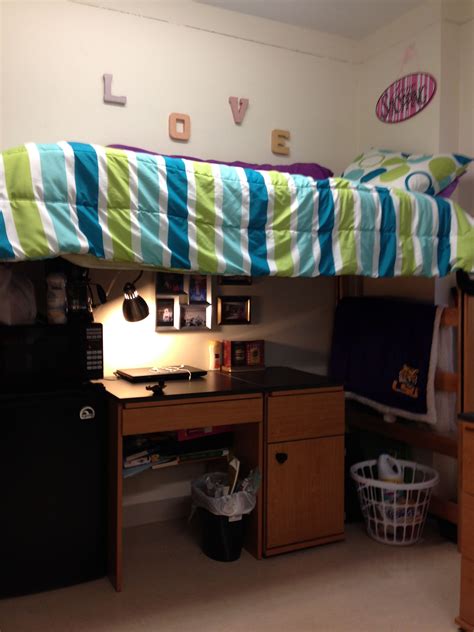 how to turn a lofted dorm bed into a much more homey space dorm room curtains dorm room