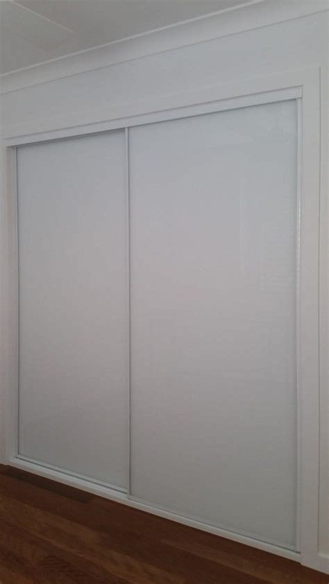 White Glass Sliding Wardrobe Doors Wardrobe Design Centre Brisbane