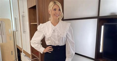 Holly Willoughby Shows Off Her Toned Legs In Black Mini Skirt And White Blouse On This Morning