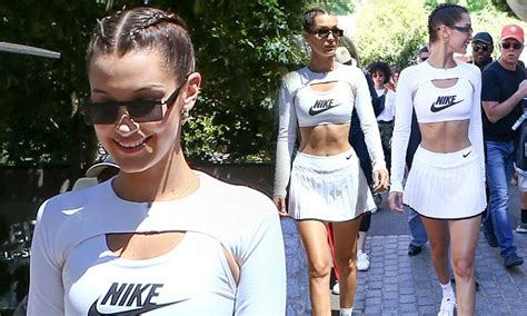 Bella Hadid Flashes Her Taut Abs In Tennis Whites Daily Mail Online