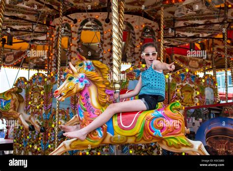 Young Girl On Carousel Stock Photo Alamy