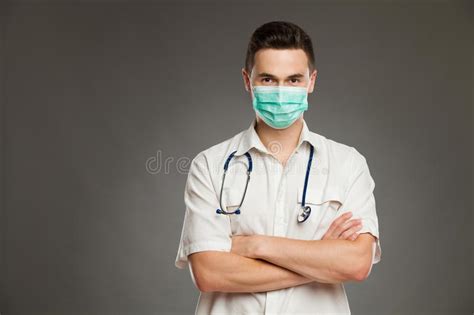 Male Doctor In Surgical Mask Stock Photo Image Of Confidence Camera