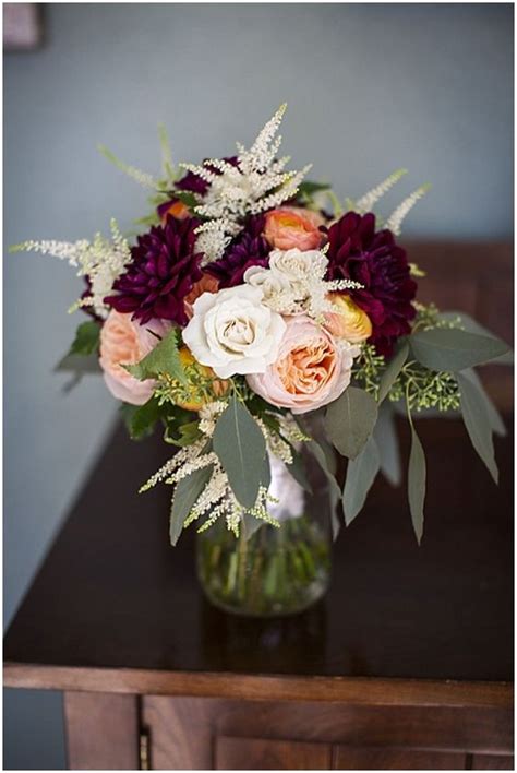 This bouquet was made to wow, lots of beautiful lush flowers and greenery. 20 Burgundy Wedding Centerpieces | Roses & Rings- Part 2