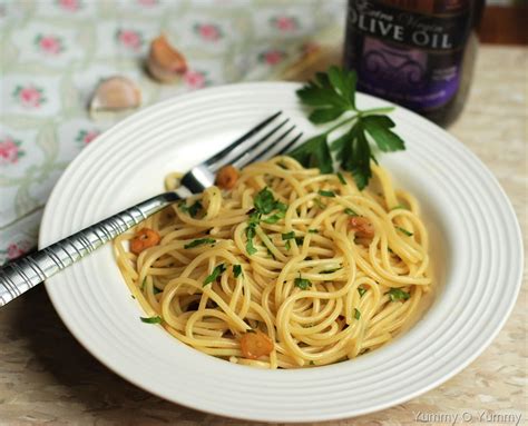 Add 1/4 cup reserved cooking liquid and cook, stirring constantly, until sauce has thickened, about 2. Pasta Aglio E Olio | Yummy O Yummy