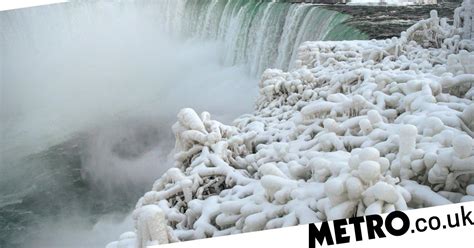 Incredible Pictures Of Frozen Niagara Falls As Temperatures Hit 20°c