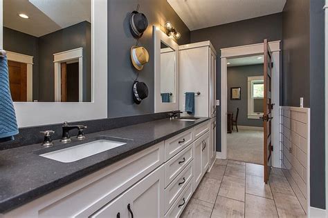 A jack and jill bathroom commonly has a single toilet, tub and shower, but could have two sinks and a double vanity. Belgium Blue Quartz | Jack and jill bathroom, Double vanity, Framed bathroom mirror