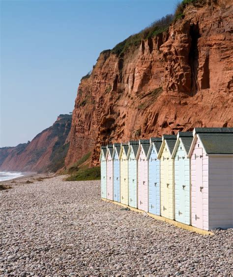 Beach Huts And Sandstone Cliffs Budleigh Salterton Stock Photo Image Of Holiday Clouds