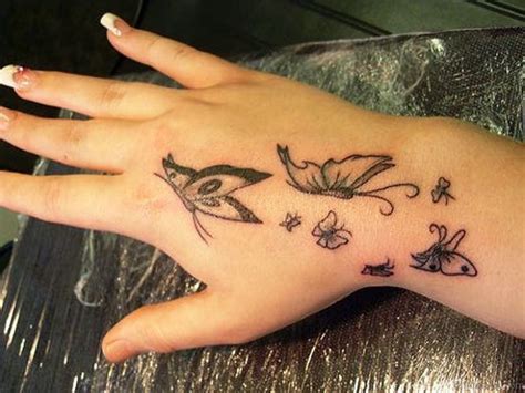 Awesome Butterfly Tattoos On Hand Tattoo Designs TattoosBag