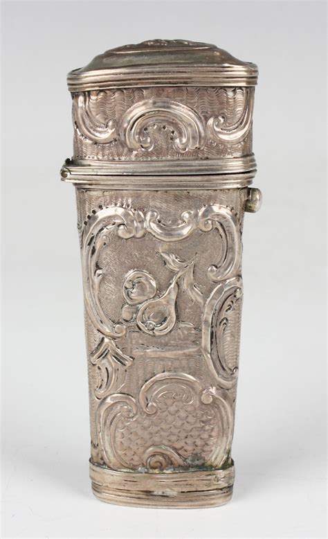 A mid 18th century silver étui of tapered oval form each side
