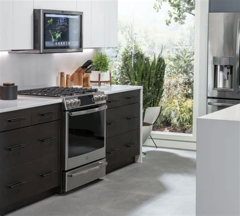 The kitchen is a sacred space where culinary magic happens. GE Kitchen Hub: Smart Range Hood with 27-inch Display at ...