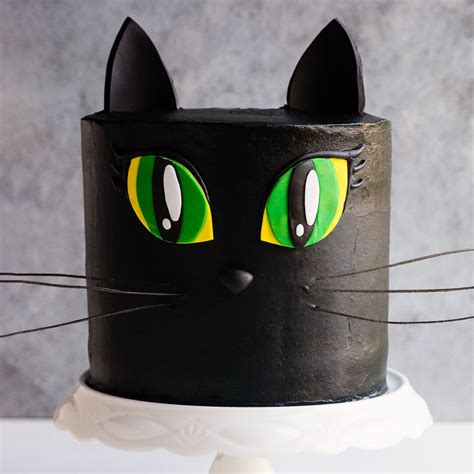 Turn a basic cake into a treat worthy of a celebration with some buttercream frosting, a cookie cutter, and a few creative details. Black Cat Cake Video Tutorial - with Pumpkin and Chocolate ...