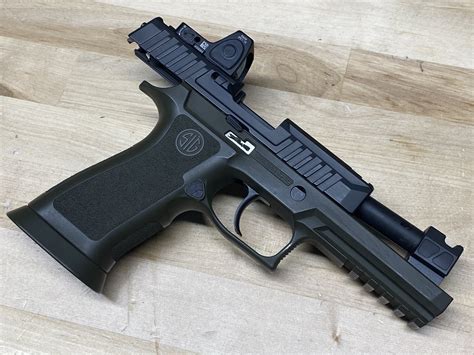 New Era Of Compensated Pistols The Pmm P320 Compensator The Firearm Blog