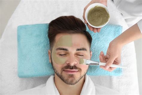 Cosmetologist Applying Mask On Client`s Face In Spa Salon Stock Image Image Of Exfoliation