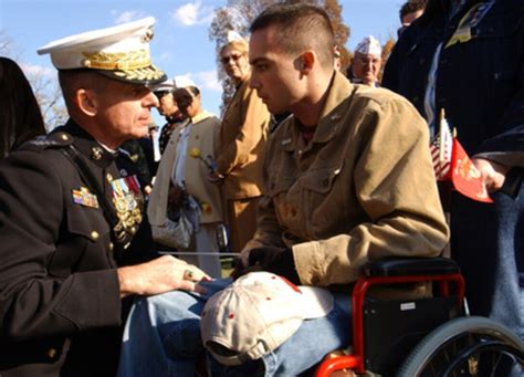 Gen Peter Pace Talks With A Marine Wounded In Operation Iraqi Freedom