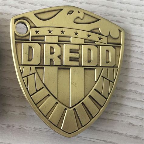 Our New Scale Judge Dredd Badge Is Coming To SDCC Next Month This Antiqued Gold Pin