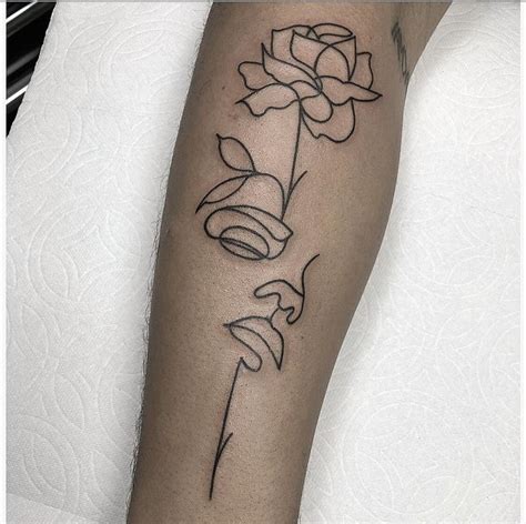 Line Art Face And Flower Tattoo Subtle Tattoos Simple Line Tattoo
