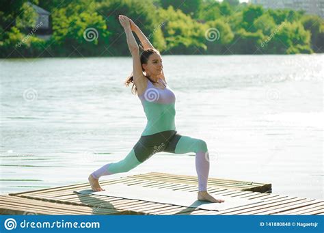 Young Slim Yoga Woman Making Beautiful Asana Exercises Healthy