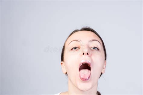 Woman With Wide Open Mouth Looking At Camera Stock Photo Image 52567847