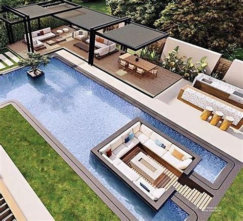 An Aerial View Of A House With A Pool In The Middle And Patio Furniture