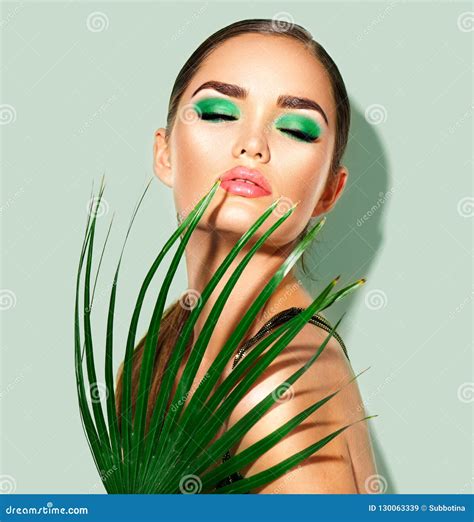 Beauty Woman With Natural Green Palm Leaf Portrait Of Model Girl With Perfect Makeup Green