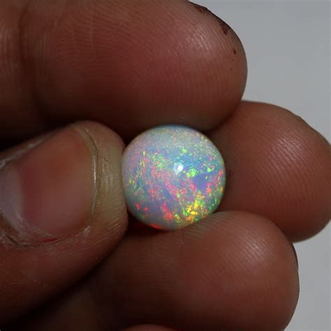 12 Mm 44 Cts Natural Aaaa Flashy Multi Fire White Ethiopian Opal Round