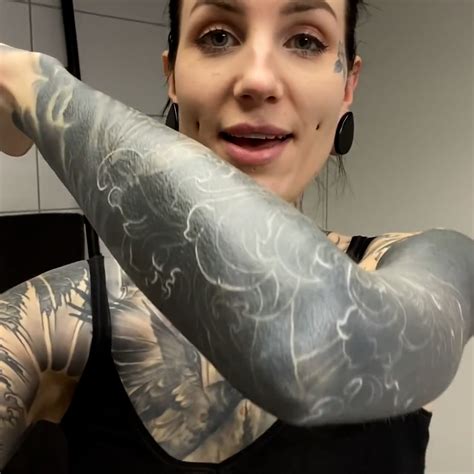 Getting An Amazing White Ink Tattoo Sleeve This Woman Completely
