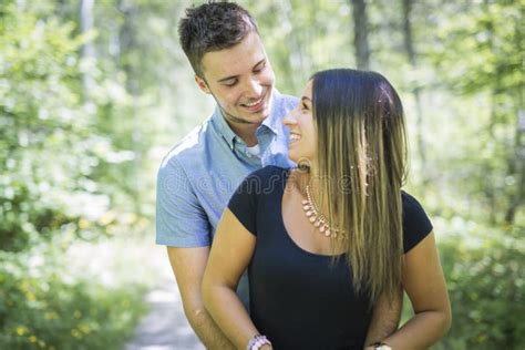 Happy Loving Young Couple At The Park Stock Image Image Of Brown