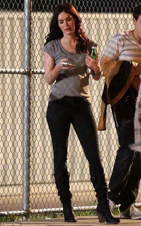 Megan Fox Fiddles With Her Phone During Late Night Break On The Set Of