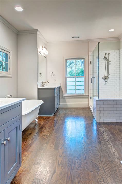 Interesting Bath Layouttub Between Vanities Wood Tile Bathroom Floor