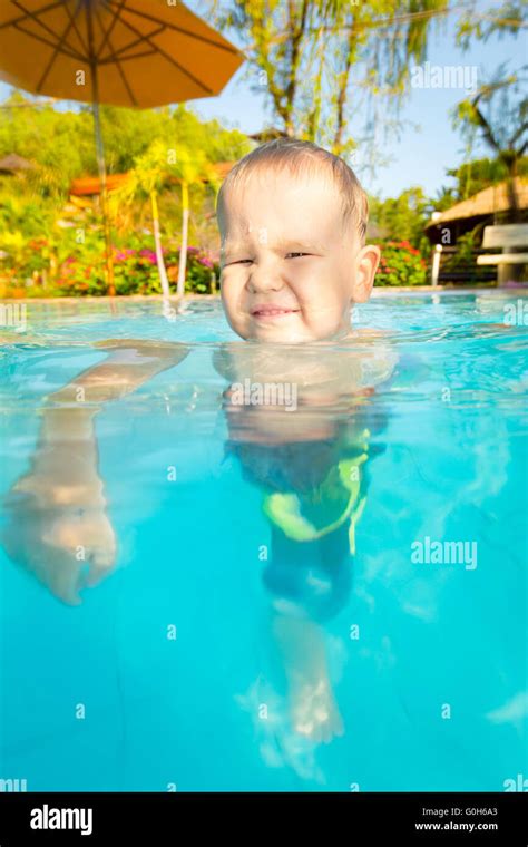 Boy In Swimming Pool Stock Photo Alamy