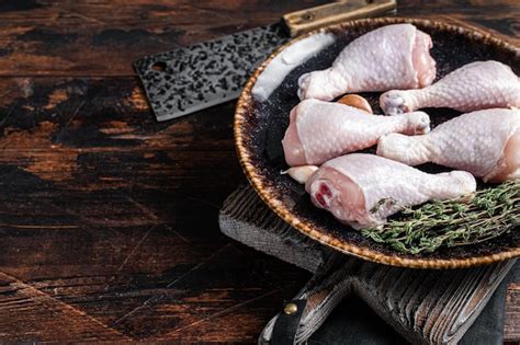Premium Photo Fresh Raw Chicken Meat Wings Breast Thigh And Drumsticks Black Background