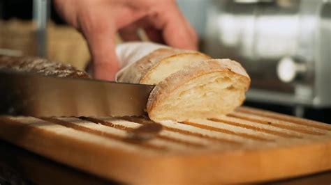 Cutting Bread Stock Video Motion Array