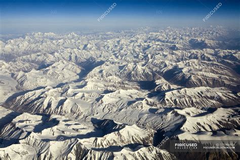 Aerial View Of The Snow Covered Himalaya Mountains As Seen On The
