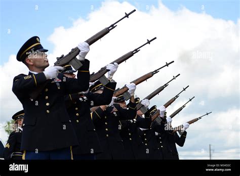 The Louisiana National Guards Funeral Detail Conducts A 21 Gun Salute