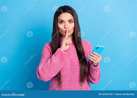 Photo Of Impressed Cute Mature Woman Wear Pink Pullover Chatting Modern Device Finger Lips Blue